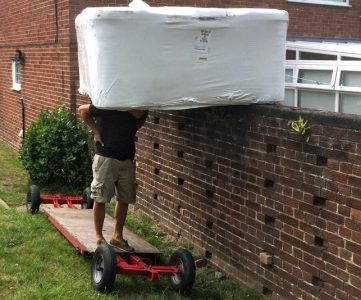 Hot tub installation at customer’s home over wall